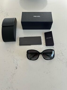 PRADA SPR 08O 1AB-5W1 BLACK W/GOLD METAL LOGO POLARIZED SUNGLASSES 57-17 130